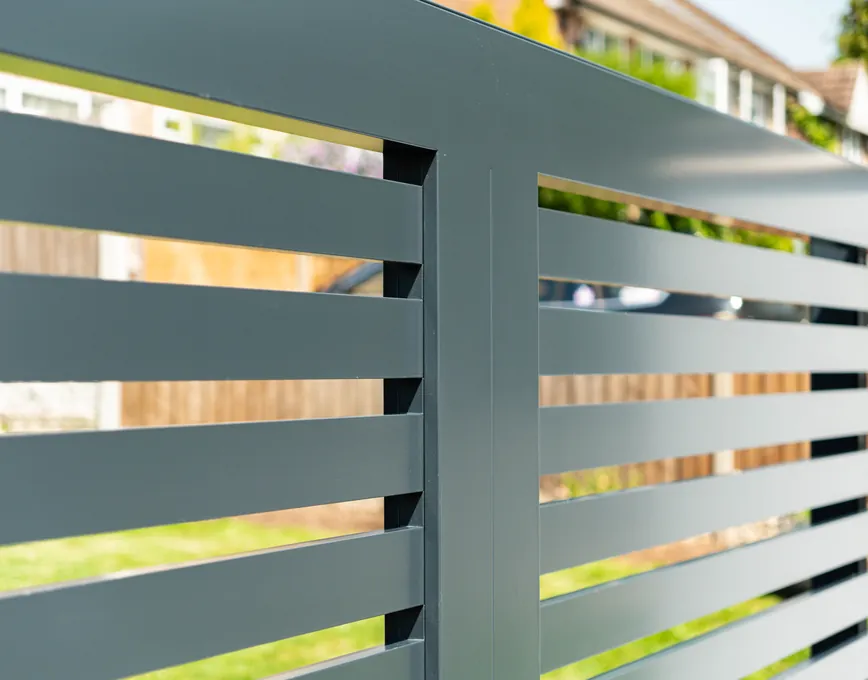 Close-up of powder-coated anthracite aluminium gate slats