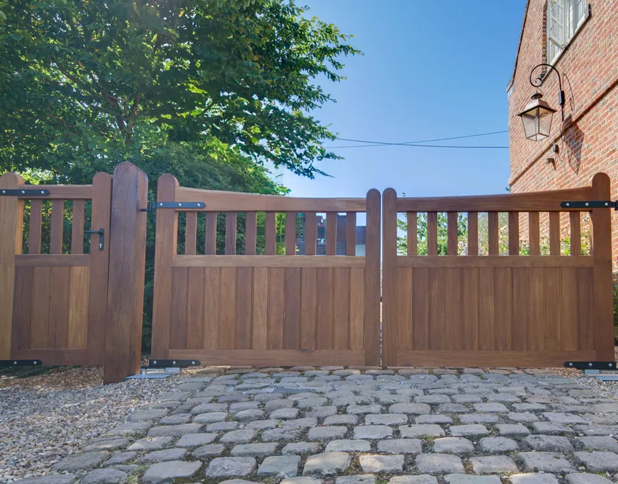 Timber swing driveway gates with a matching pedestrian gate, Hanbury