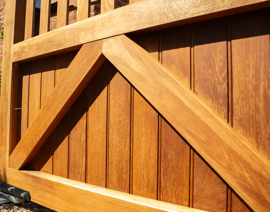 Close-up of the boards and cross brace on a hardwood gate