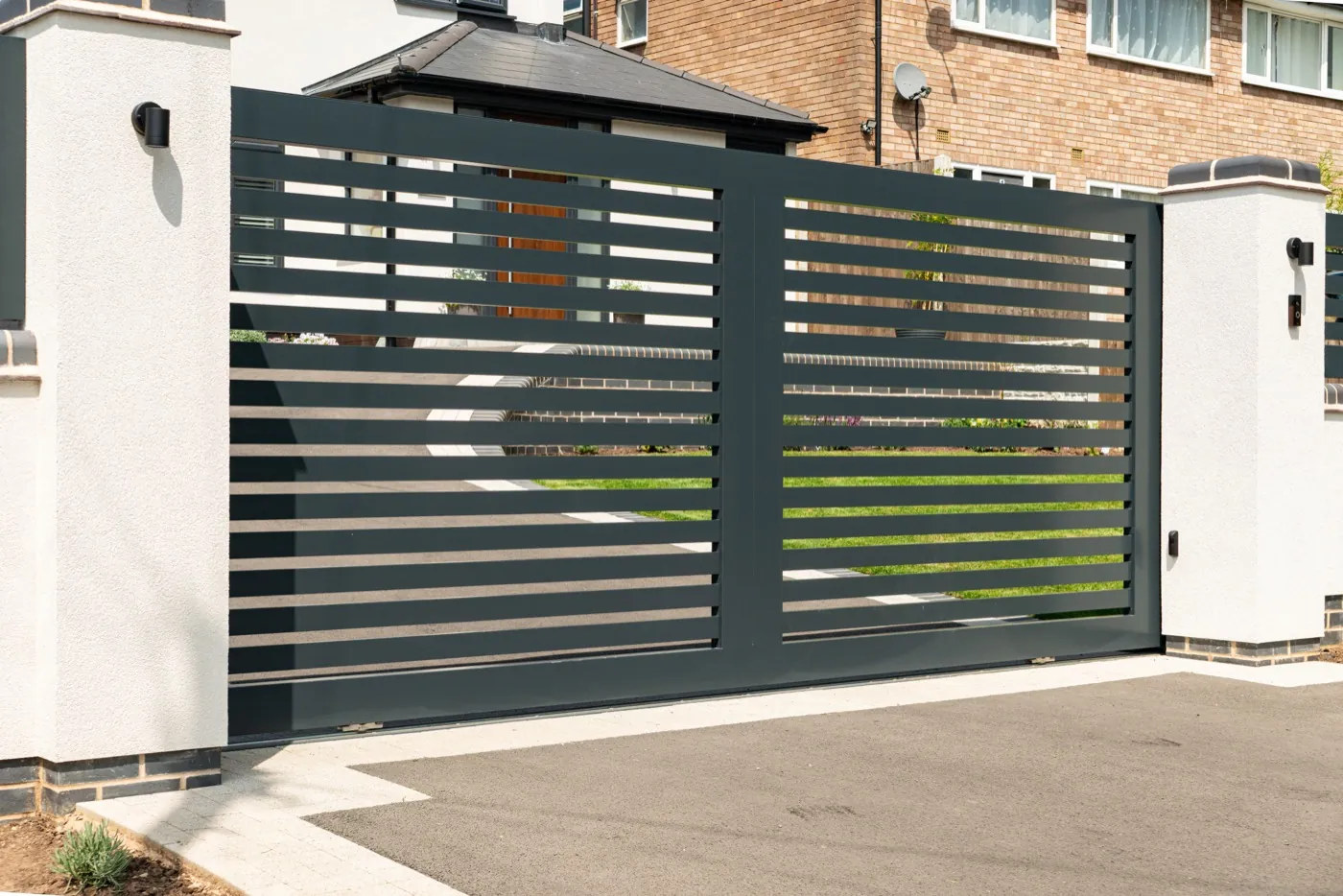 Aluminium sliding gate with matching pedestrian gate, near Redditch