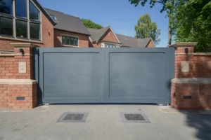 Contemporary anthracite aluminium sliding driveway gate, front view, Solihull