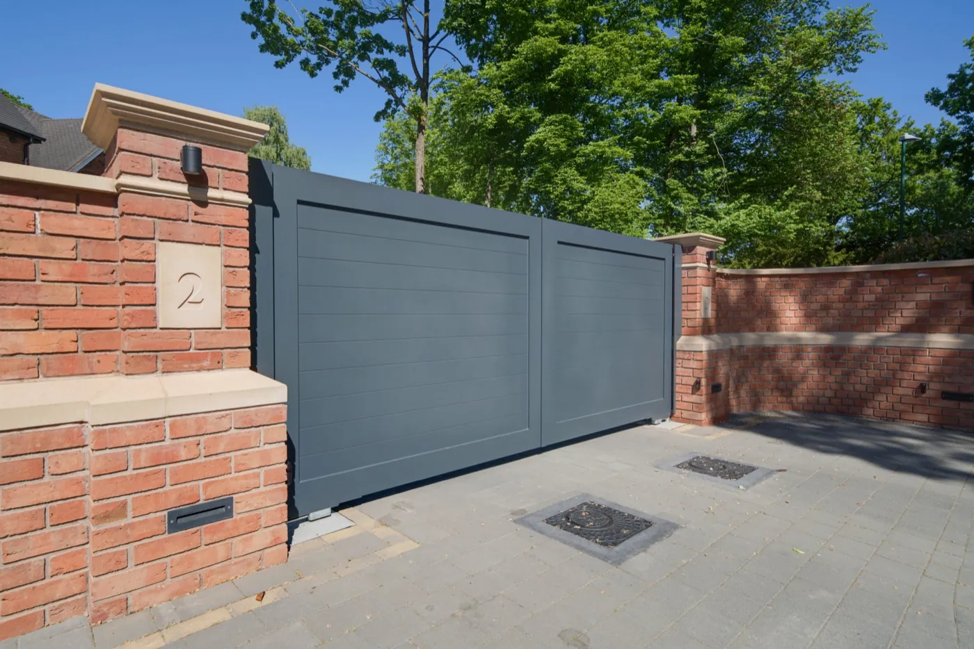 Aluminium sliding gate open, running along the boundary wall, Solihull