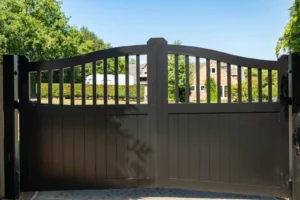 Black traditional swing gates with an arched spindle top, Blackwell