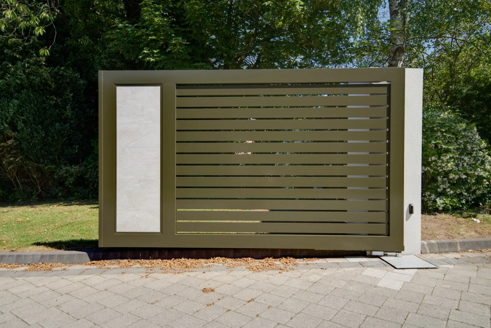 Matching olive green side gate with a stone-effect panel